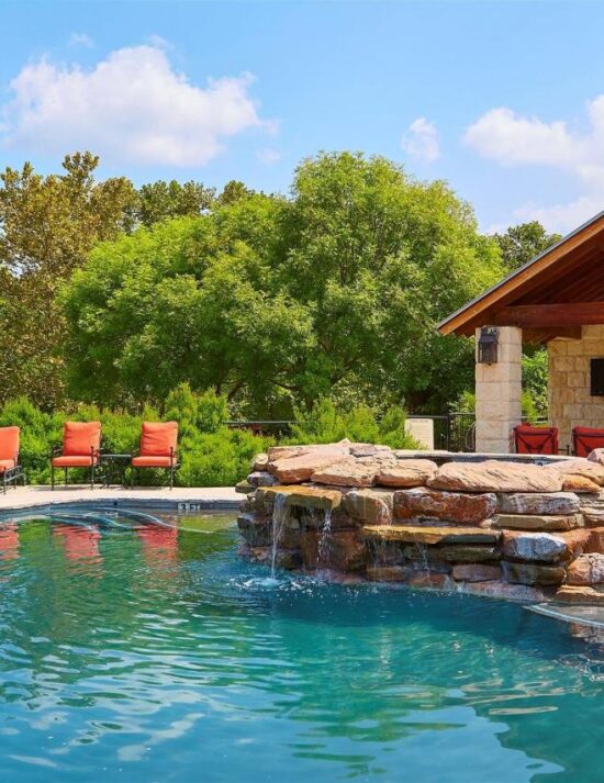 View of the pool and rocks during day